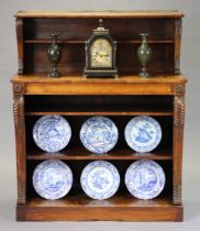 A 19th century mahogany open bookcase, with pierced brass gallery and shallow shelf above a