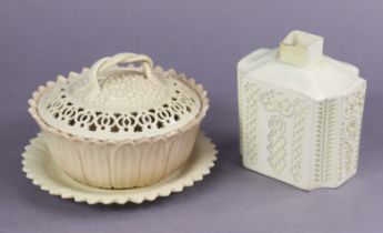 An 18th century English creamware cruciform tea caddy with reticulated decoration, the underside