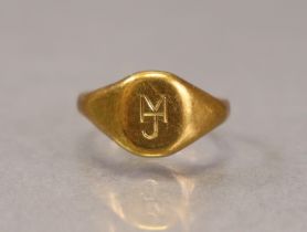 An 18ct gold signet ring with engraved monogram, Birmingham 1934, size N (3g).