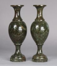 A pair of Victorian Cornish red & green serpentine marble vases, of slender ovoid form, each on