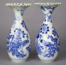 A pair of 19th century Japanese blue & white Arita porcelain ovoid vases with scalloped rims,