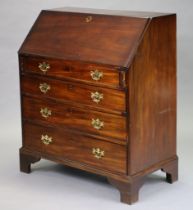 An 18th century mahogany bureau with fitted interior and gilt-tooled leather writing surface