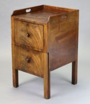 A late 18th century mahogany tray-top bedside commode fitted small cupboard enclosed by a fall-front