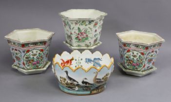 Three Chinese porcelain hexagonal jardinieres with floral decoration and separate stand, 21.5cm wide