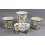 Three Chinese porcelain hexagonal jardinieres with floral decoration and separate stand, 21.5cm wide