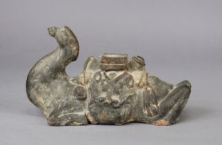 An early Chinese terracotta model of a recumbent camel, 25cm long x 15cm high (re-stuck).