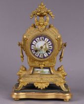 A 19th century French gilt-metal & porcelain-mounted mantel clock, the enamelled dial with painted