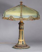 An art nouveau painted-metal & semi-opaque glass table lamp, the hexagonal shade with reverse-laid