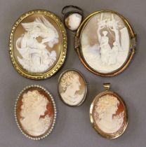 A Victorian carved shell large cameo brooch with classical figure scene in gilt metal mount; another