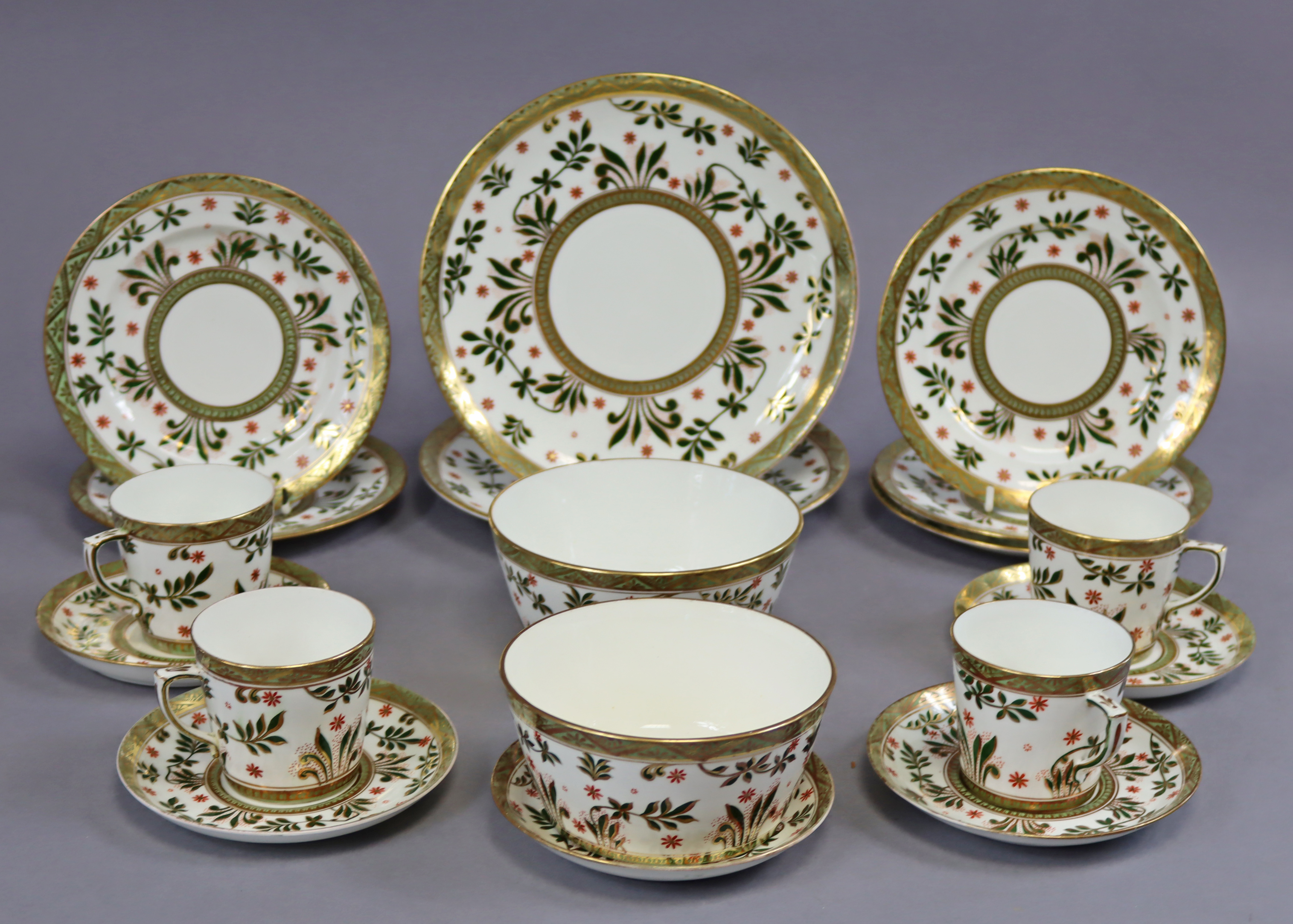A T. A. & S. Green porcelain eighteen-piece part tea service of white ground with green and gilt
