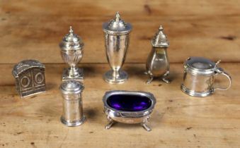 A late 19th century Dutch silver rectangular pill box in the form of an armoire, the hinged domed