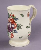 An 18th century Leeds creamware baluster tankard with inter-woven strap handle, boldly painted