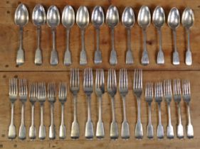 A matched service of Georgian & Victorian silver fiddle pattern flatware, comprising six table
