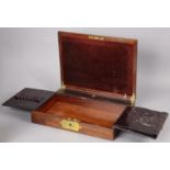 An early Victorian mahogany & brass inlaid travelling writing case, the hinged lid revealing morocco