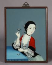 A 20th century Chinese reverse-painting on glass depicting an elegant lady holding flowers, in