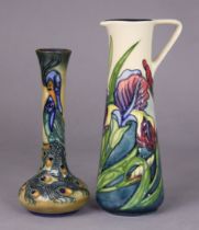 A modern Moorcroft pottery slender tapered ewer decorated with irises, 24cm high; & a ditto vase