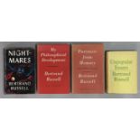 Four 1st-edition volumes by Bertrand Russell titled “My Philosophical Development” (1959), “Night-