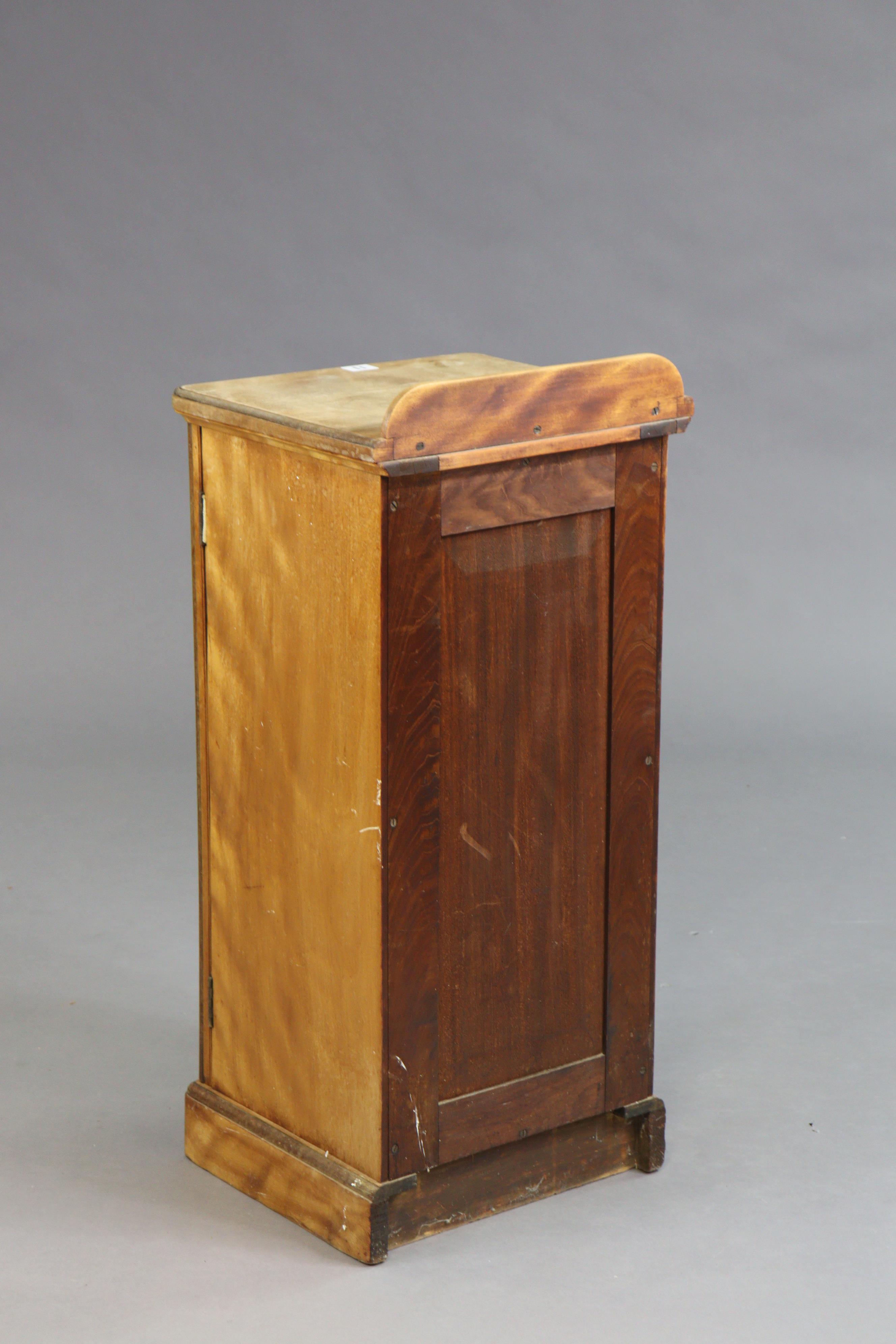 A Victorian mahogany bedside cupboard enclosed by a panel door, & on a plinth base, 36.5cm wide x - Image 6 of 9