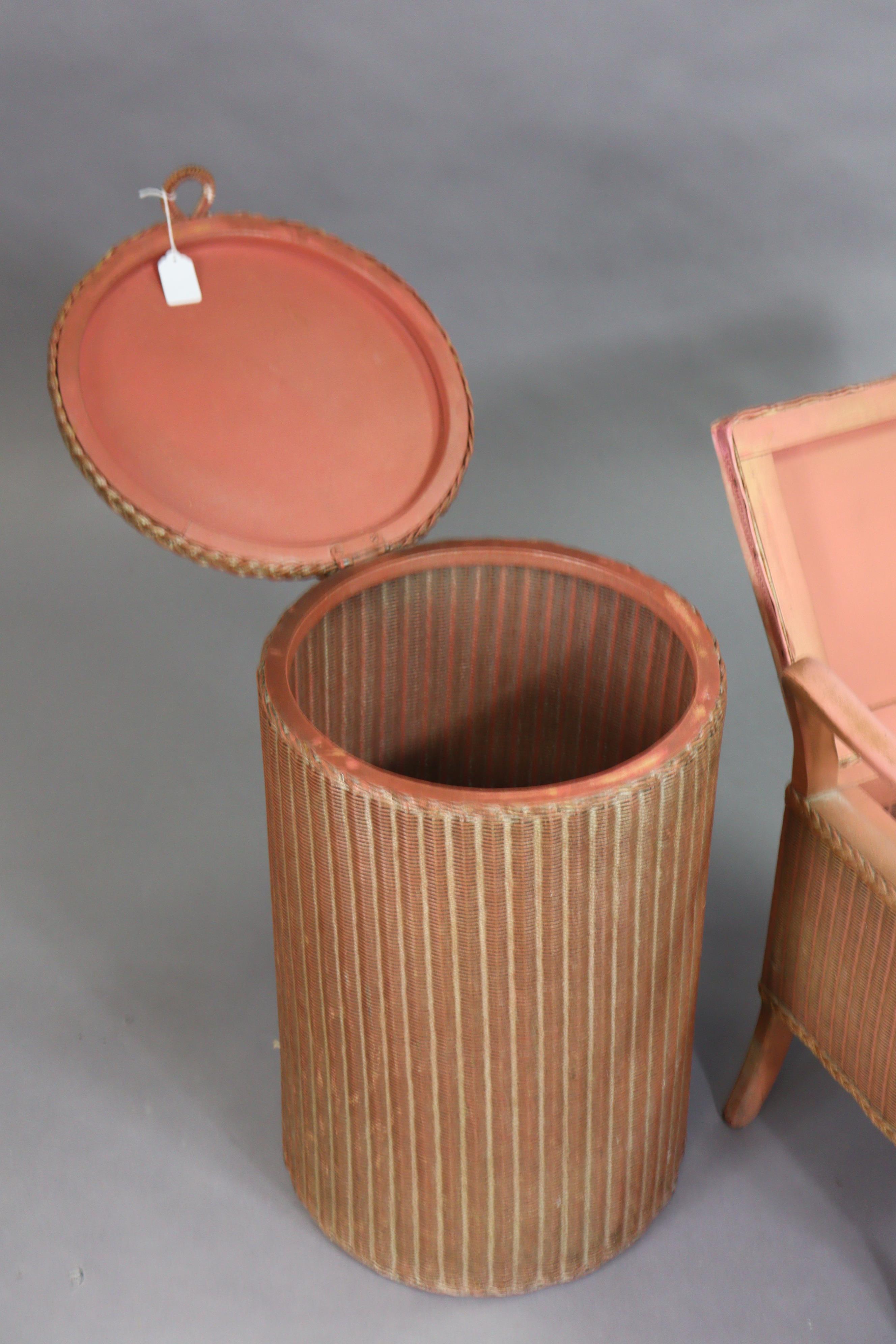 A Lusty’s Lloyd Loom pink painted cylindrical linen box; a similar Sirram box-seat stool; & a - Image 7 of 8