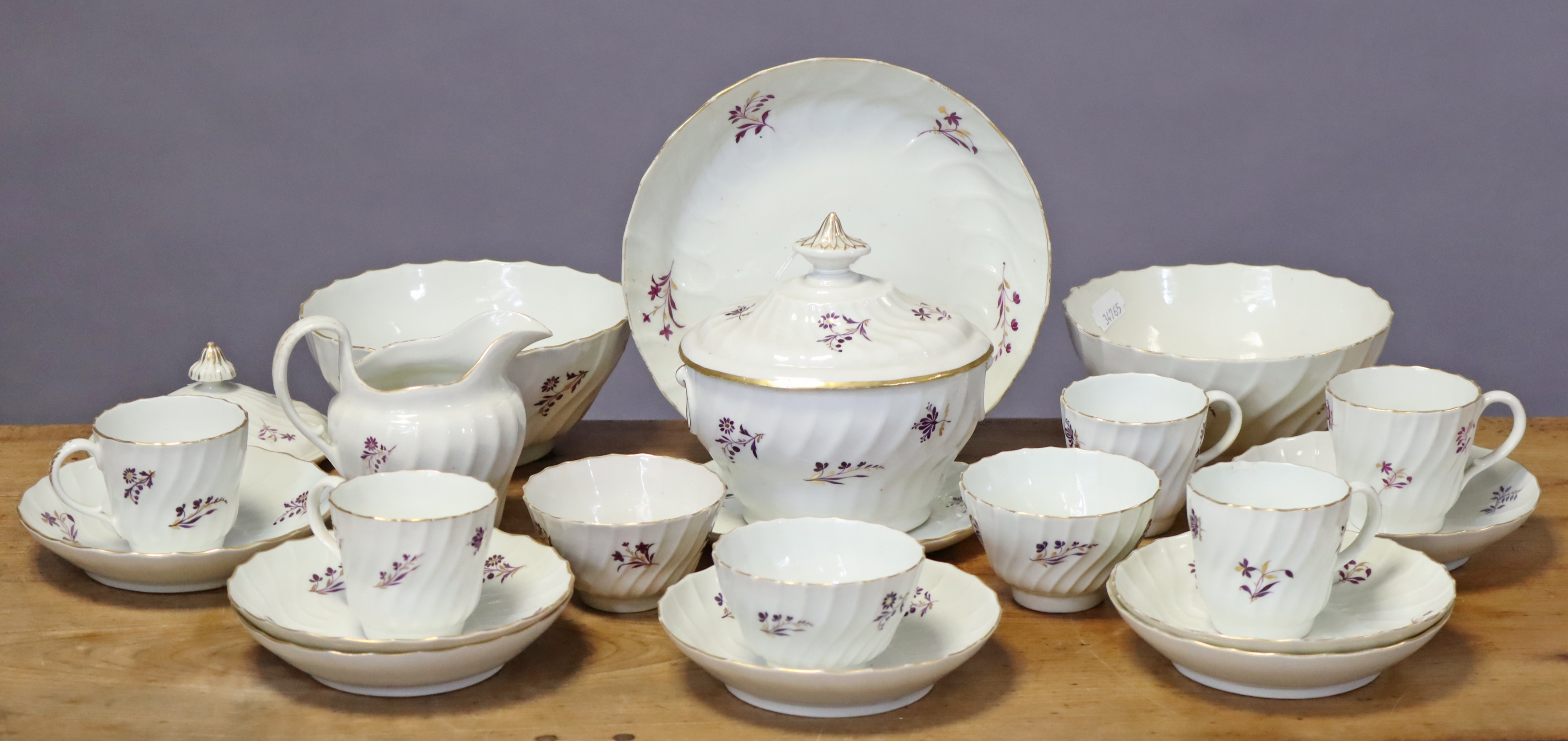 Twenty-two items of late 18th/early 19th century English porcelain tea & coffee ware of spiral