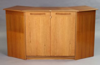 A mid-20th century teak drop-leaf drinks cabinet, side cabinet with two adjustable shelves