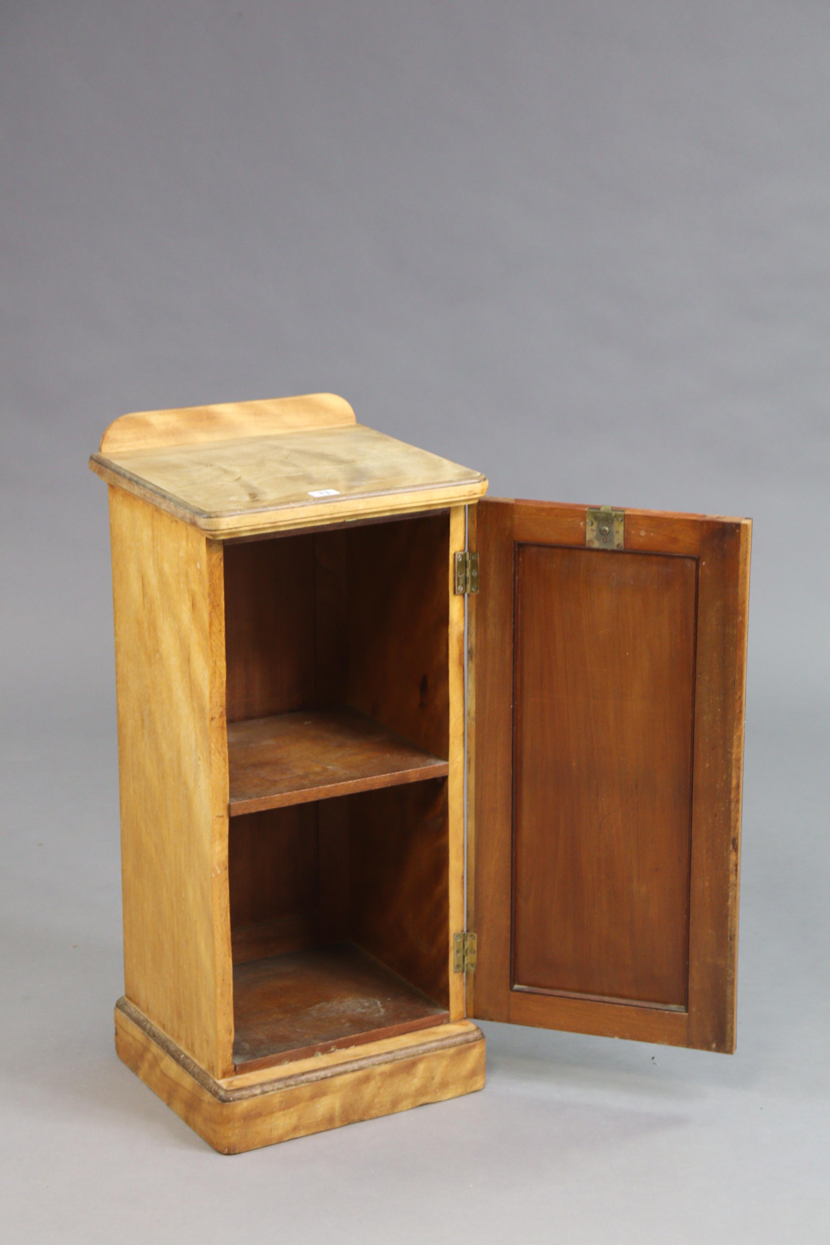 A Victorian mahogany bedside cupboard enclosed by a panel door, & on a plinth base, 36.5cm wide x - Image 3 of 9