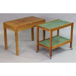 A mid-20th century teak card table inset green baize to the rectangular fold-over top, & on four