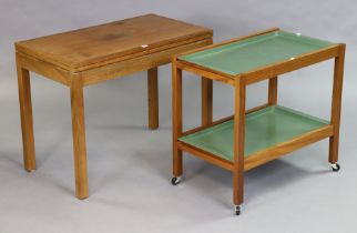 A mid-20th century teak card table inset green baize to the rectangular fold-over top, & on four