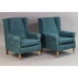 A pair of Victorian-style wing-back armchairs by Sofa.com upholstered turquoise fabric, & on short