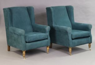 A pair of Victorian-style wing-back armchairs by Sofa.com upholstered turquoise fabric, & on short