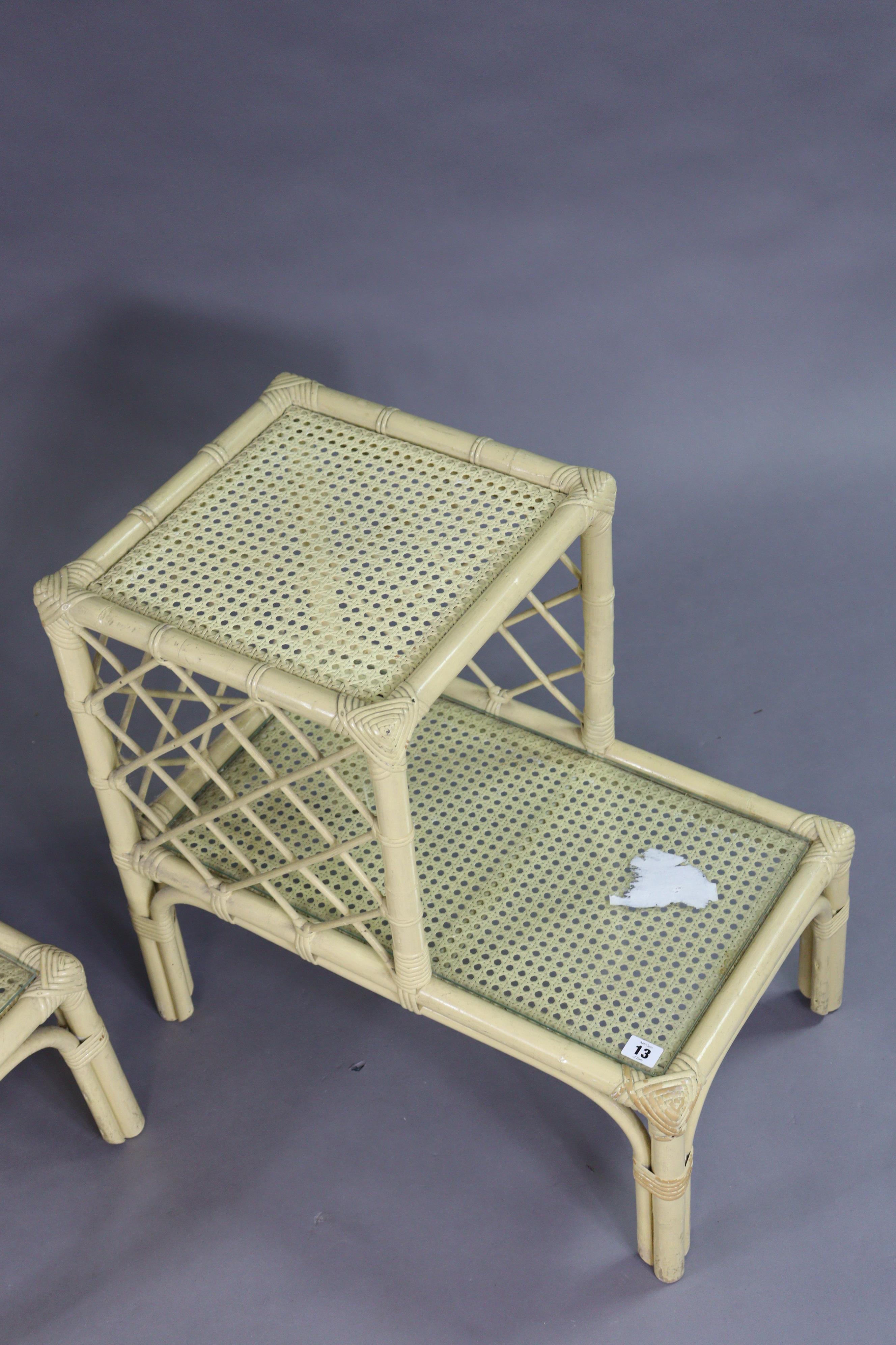 A pair of cream-painted wicker & cane two-tier occasional tables, each inset glass tops. - Image 2 of 5