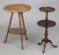 A late 19th century arts & crafts carved oak circular two-tier occasional table dated 1896, on three