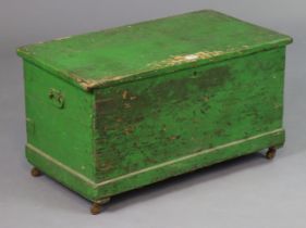 A late 19th/early 20th century green painted small blanket box with a hinged lift-lid, wrought-