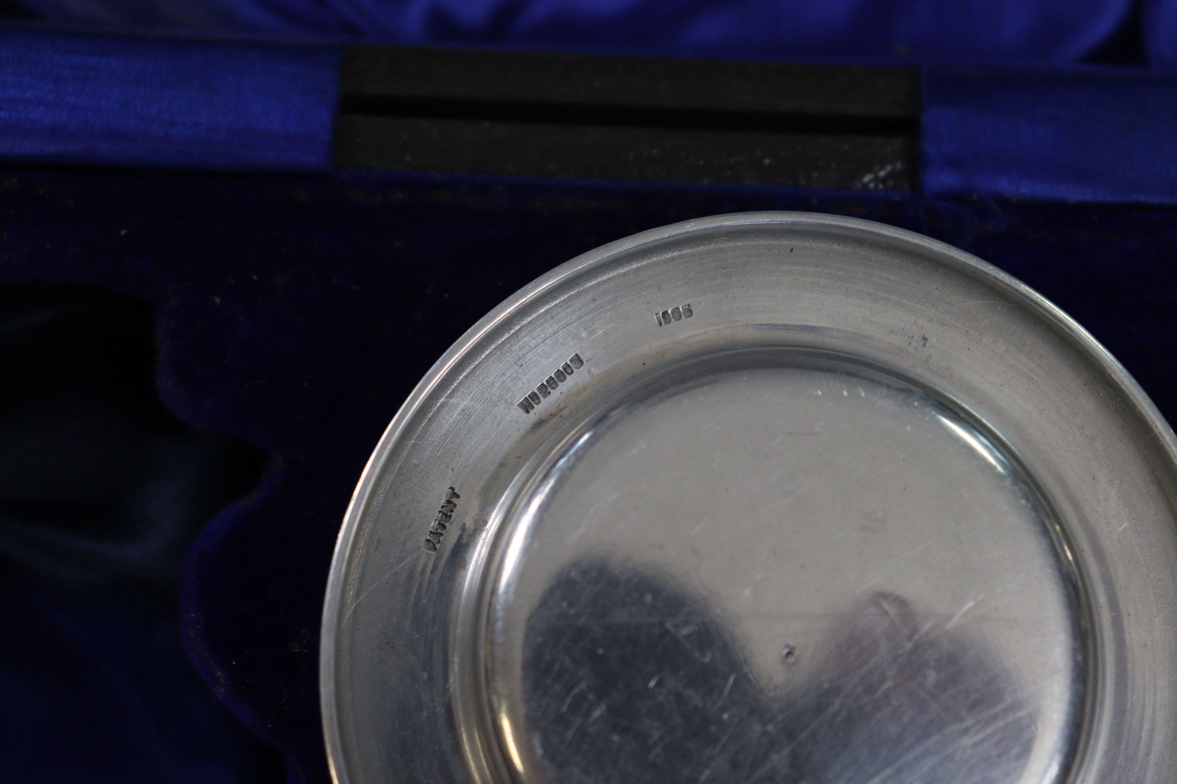 A stainless-steel seven-piece priest’s travelling communion set, with case. - Image 3 of 3