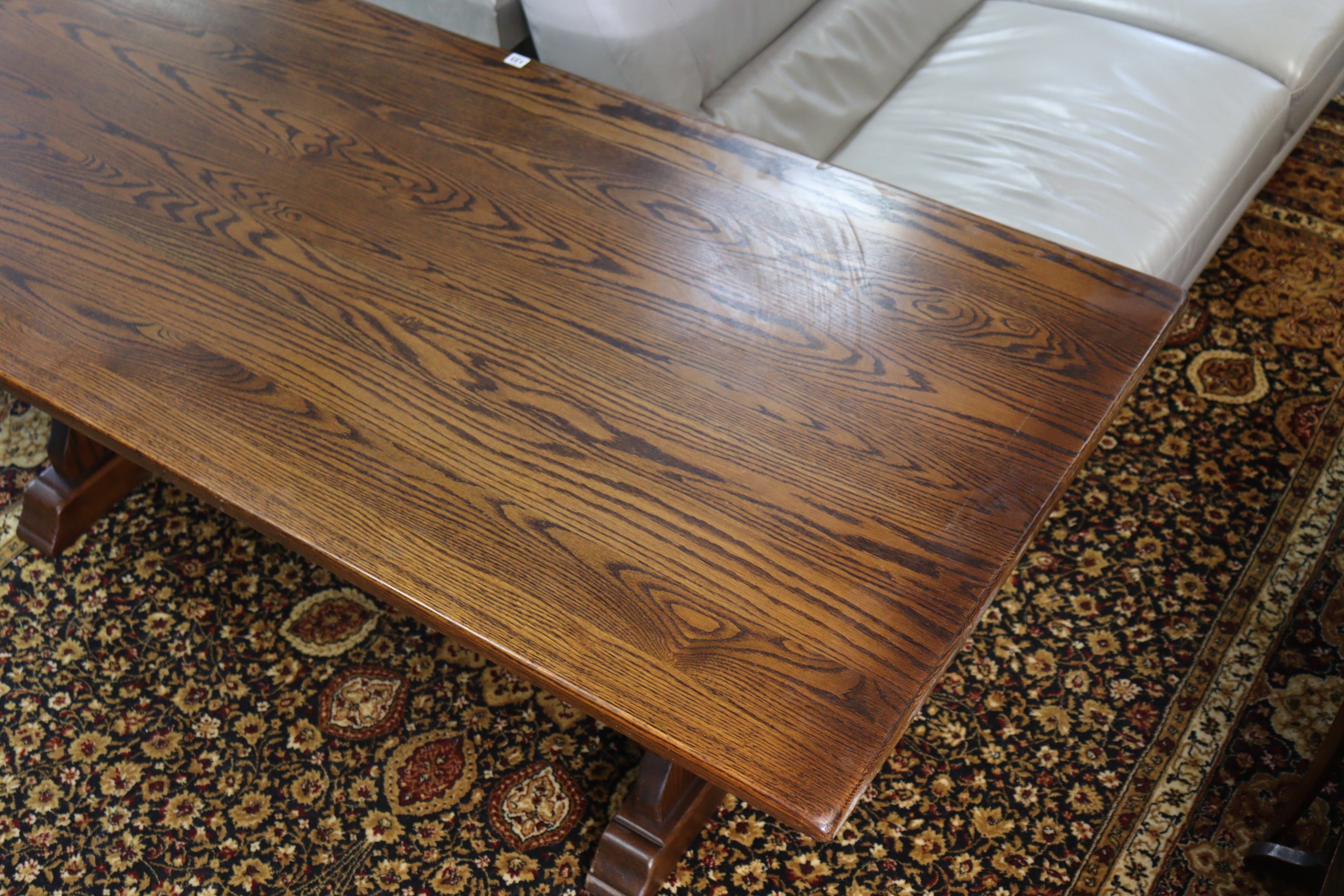 An oak refectory table with a rectangular top, & on shaped end supports joined by a shaped centre - Image 3 of 4