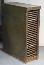 A vintage grey metal small upright office cabinet bears plaque “John Haddon & Co. of London”