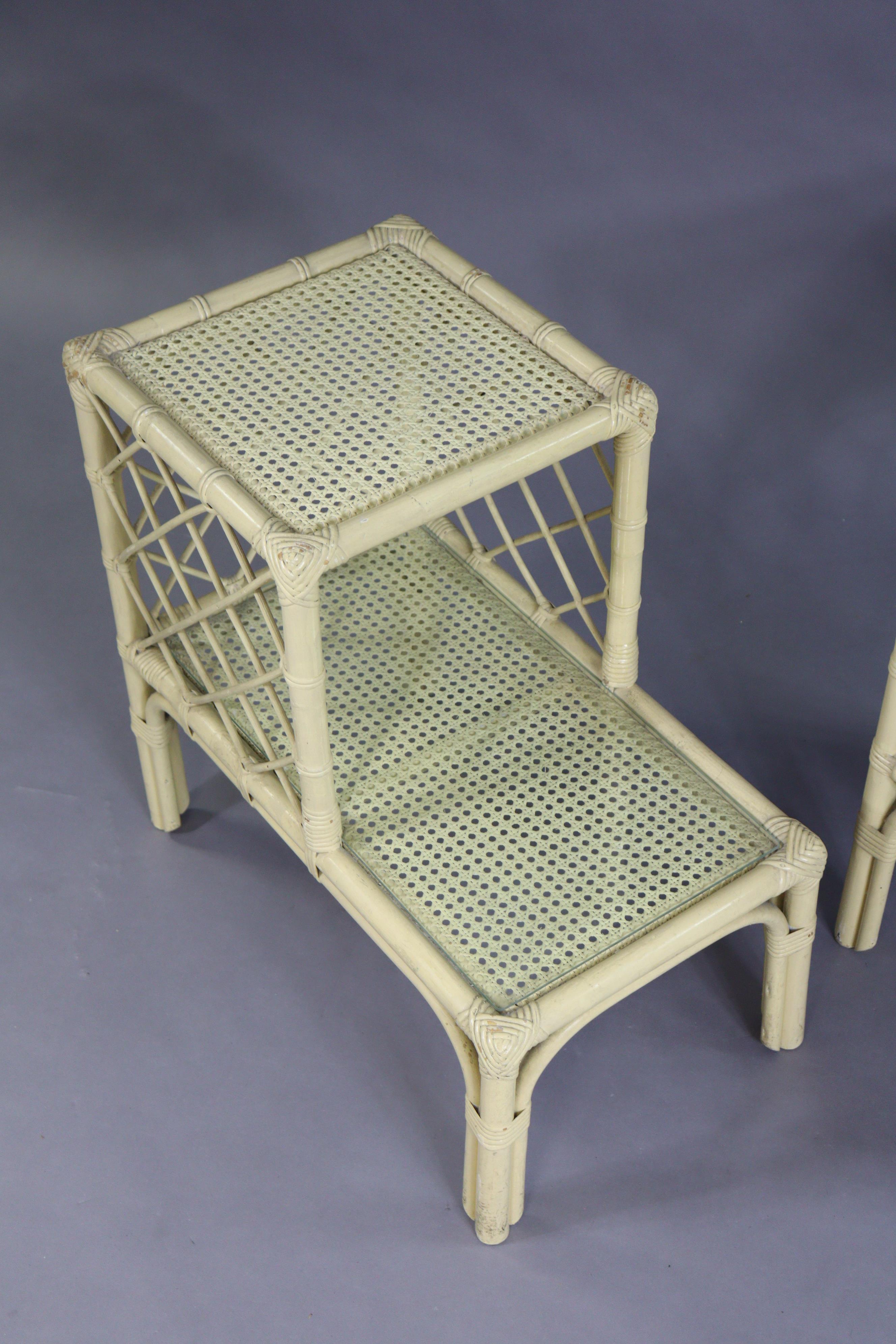 A pair of cream-painted wicker & cane two-tier occasional tables, each inset glass tops. - Image 3 of 5