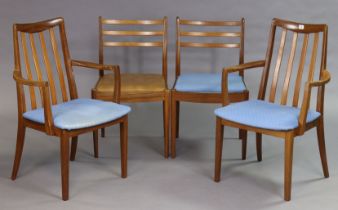 A matched set of four teak rail-back dining chairs (including a pair of carvers).