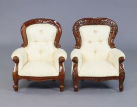 A pair of Victorian-style buttoned-back child’s armchairs each on cabriole legs.