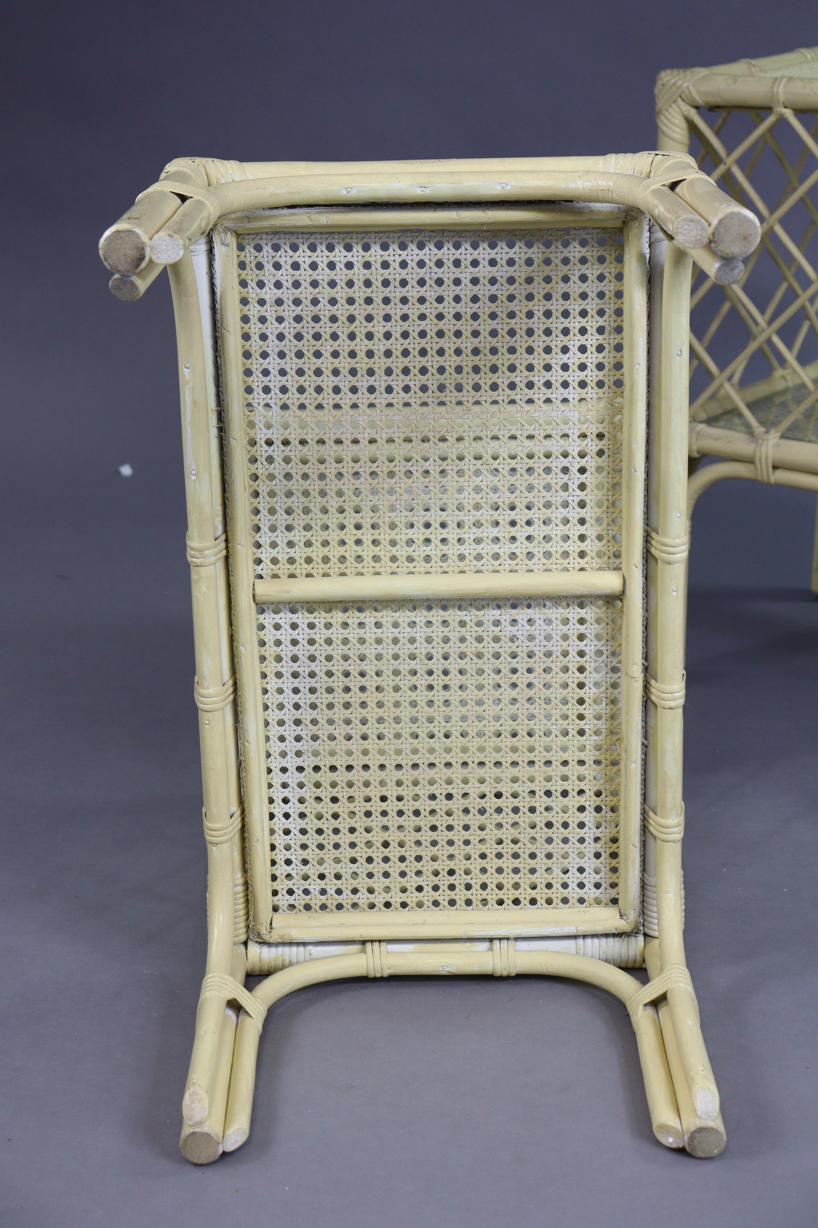 A pair of cream-painted wicker & cane two-tier occasional tables, each inset glass tops. - Image 5 of 5