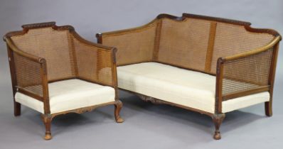 A beech frame bergère two-piece lounge suite comprising a two-seater settee & armchair, each