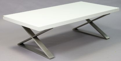 A modern tempered glass square occasional table on four faux leather square tapered legs, 89.5cm