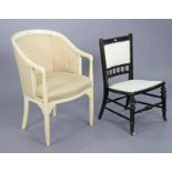 A continental-style cream painted wooden-frame tub-shaped chair with a padded seat & arms, & on