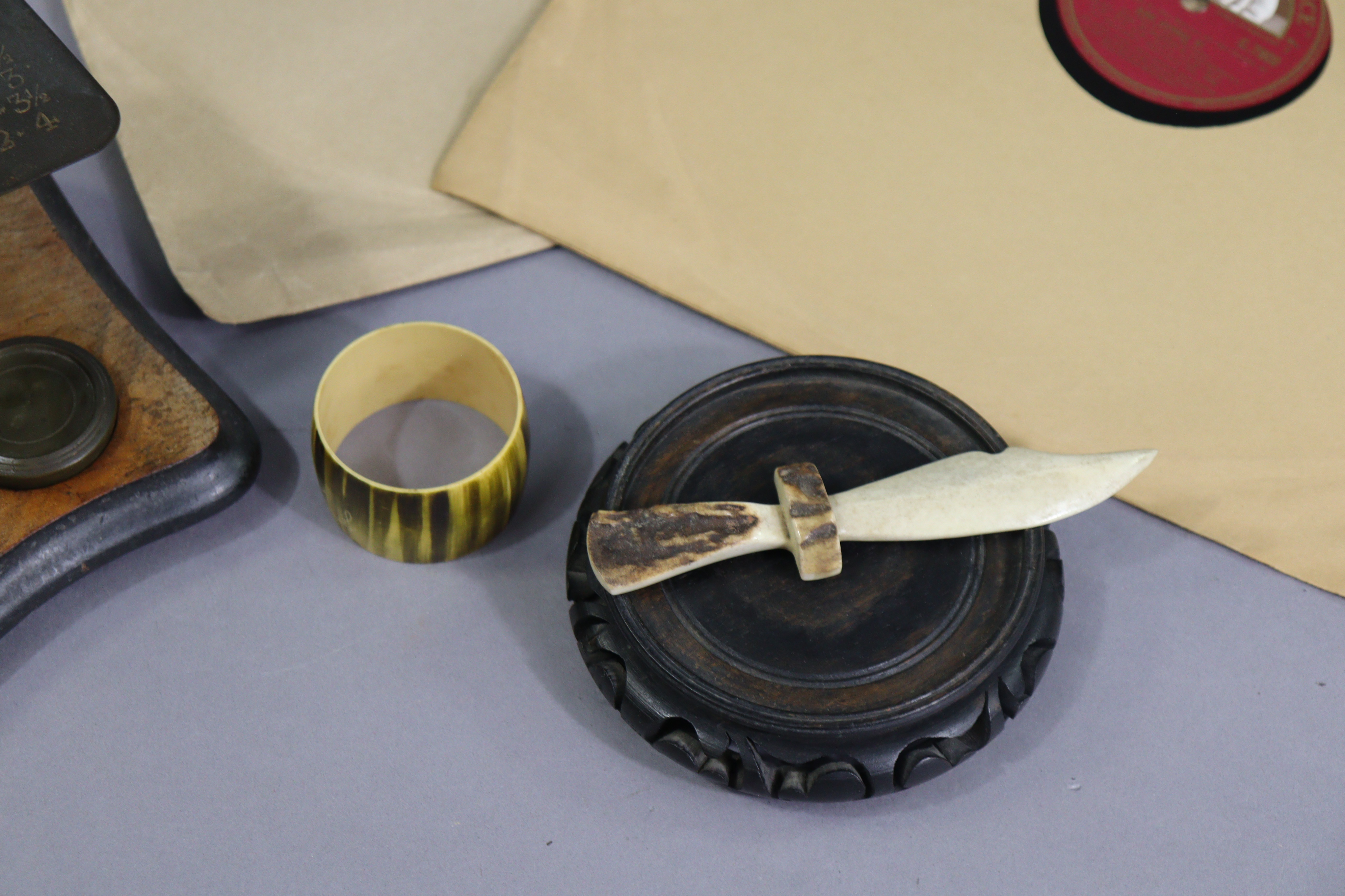 A vintage brass letter scale mounted on a wooden serpentine-front base, with weights; together - Image 3 of 7