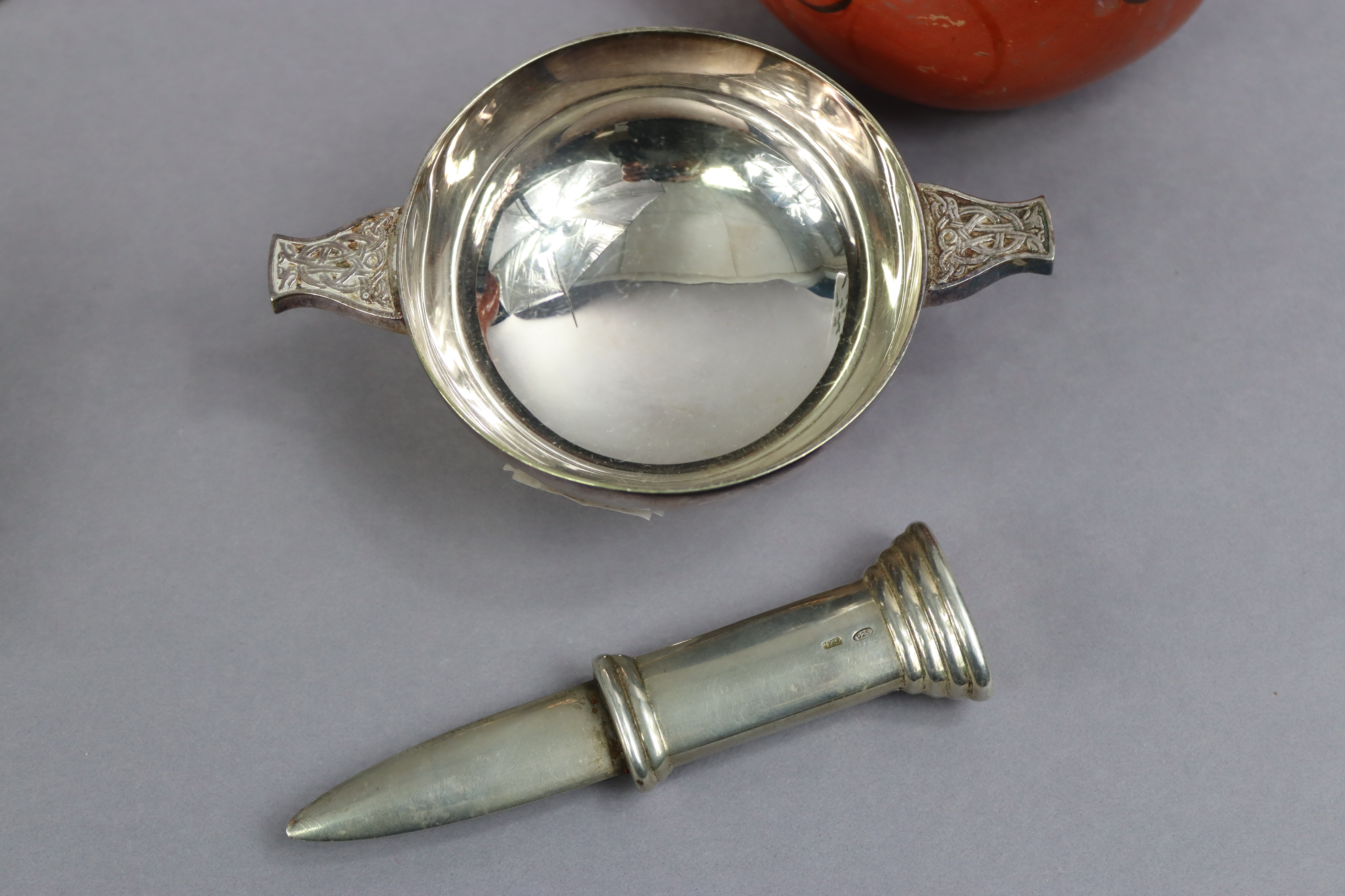 A silver “Knife” desk ornament, 10.5cm long; two silver plated scallop-shaped dishes; a plated - Image 2 of 8