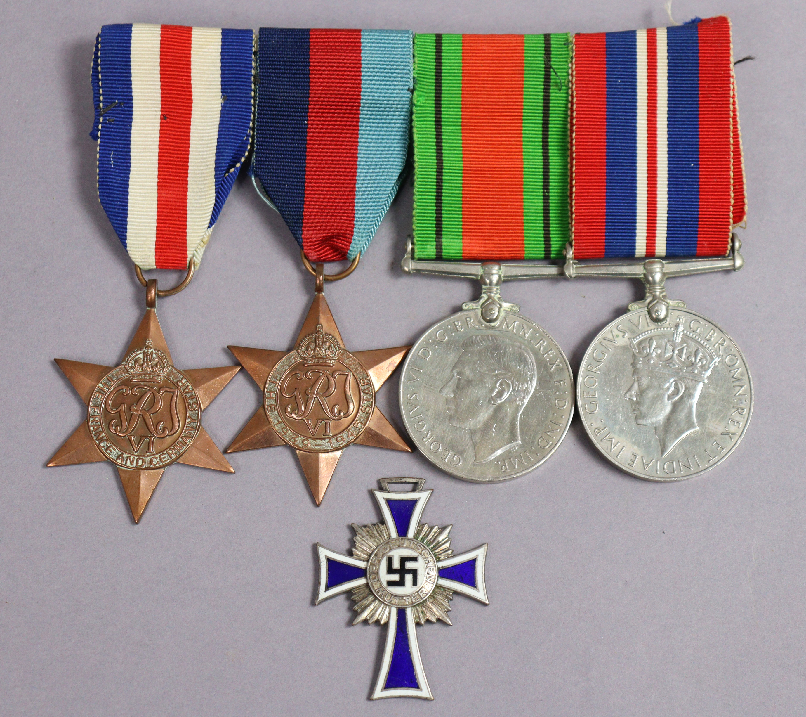 A Second World War group of four: France & Germany Star, 1939-45 Star, Defence & War Medals, un-