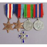 A Second World War group of four: France & Germany Star, 1939-45 Star, Defence & War Medals, un-