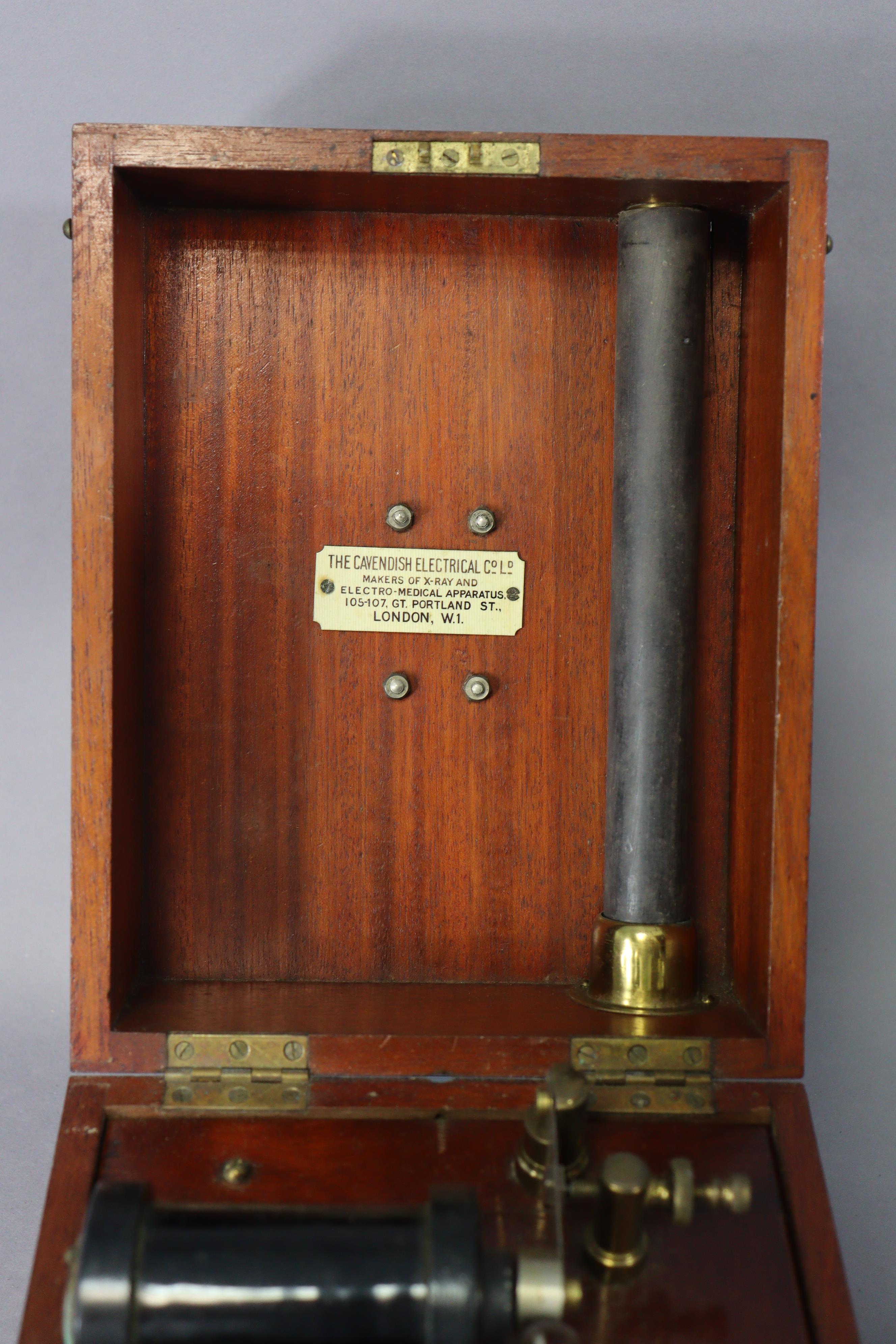 A vintage electric-shock instrument by the Cavendish Electrical Co of London in a mahogany case, and - Image 3 of 8