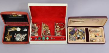 Four silver dress rings; a silver brooch; four ladies’ wristwatches; & various items of costume