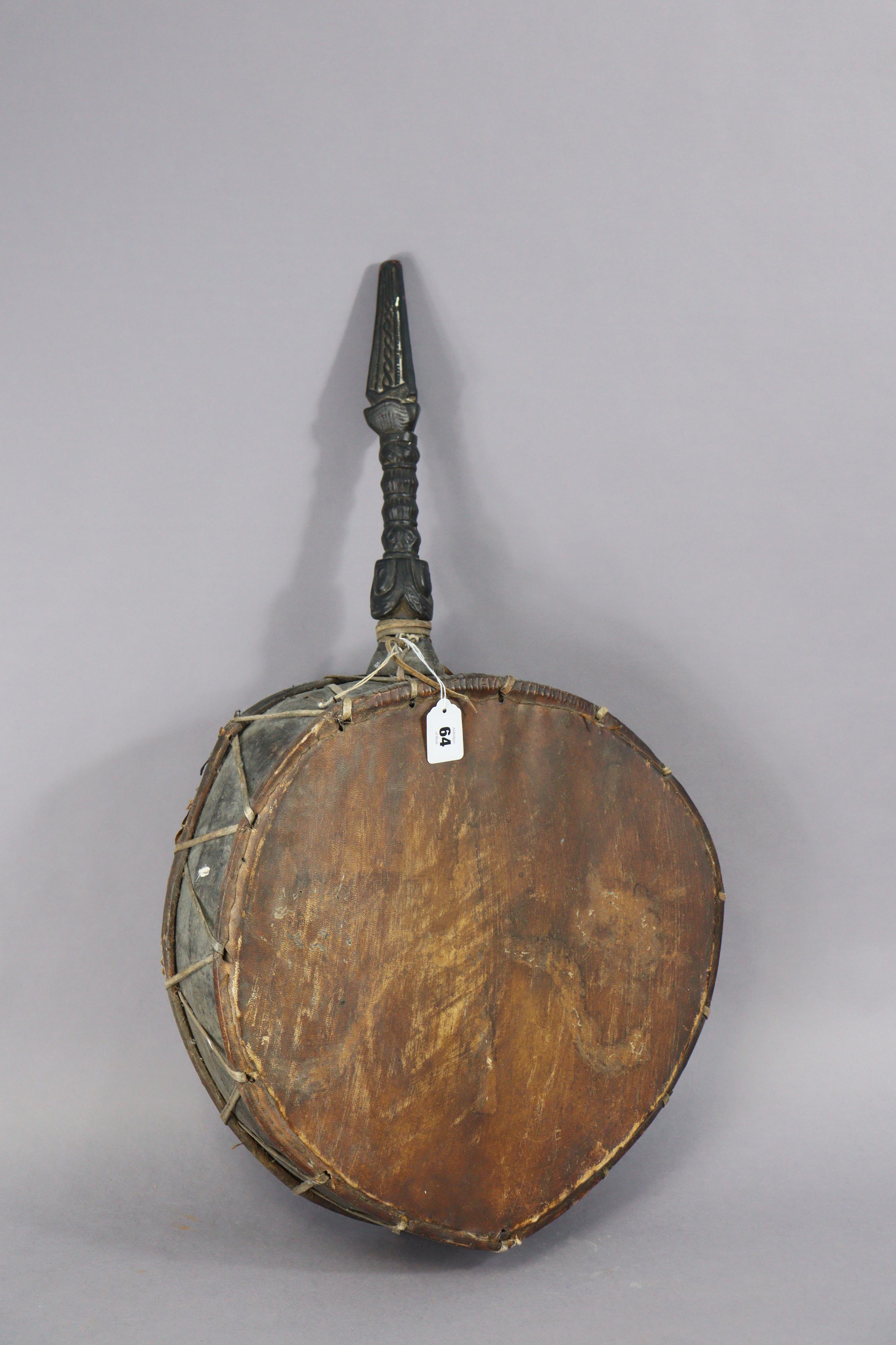 A Nepalese shaman’s drum or Dhyango having an ebonised & carved wooden handle, 44cm diameter x - Image 2 of 6